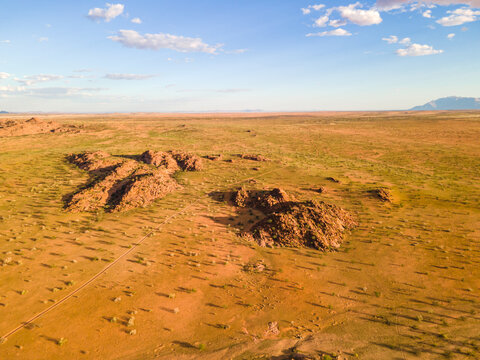 Aerial view of Twyfelfontein bushland landscape at sunset, Kunene region, Namibia.