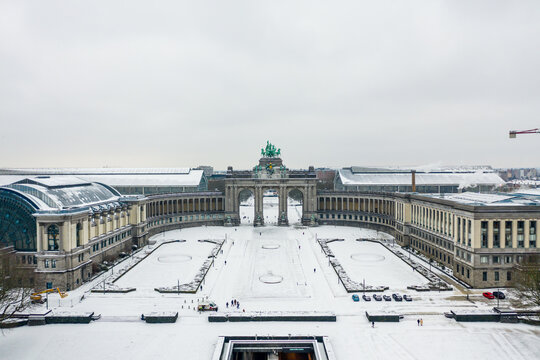 Aerial view of Arc du Cinquantenaire, a stately triple arch monument in wintertime, Brussel, Belgium.