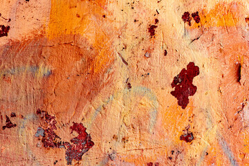 Texture of a concrete wall with cracks and scratches which can be used as a background