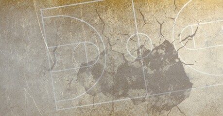 Composition of basketball court over cracked distressed surface
