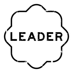 Grunge black leader word rubber seal stamp on white background