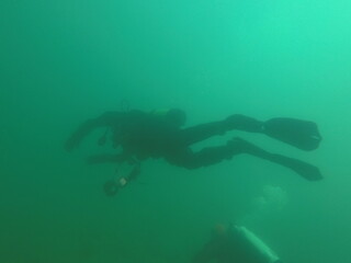 Diving into the Darkness of the lake of Thun, Switzerland