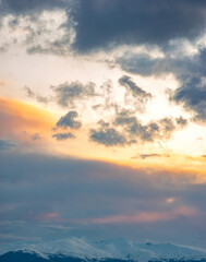 Clouds in the sky at sunset in the mountains