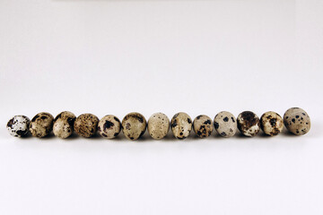 Quail eggs on the white background