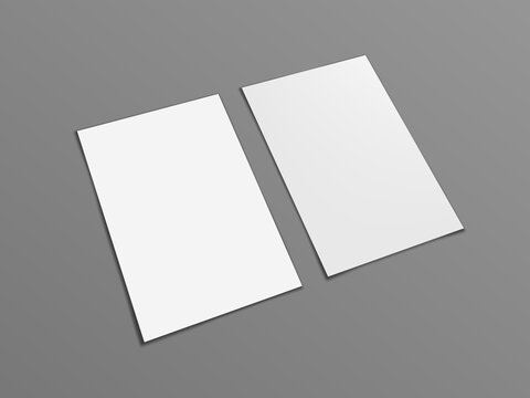 Two Blank Portrait A4 White Paper Isolated On Gray