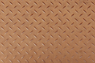Top view of Slightly rusted steel diamond pattern sheet as background.