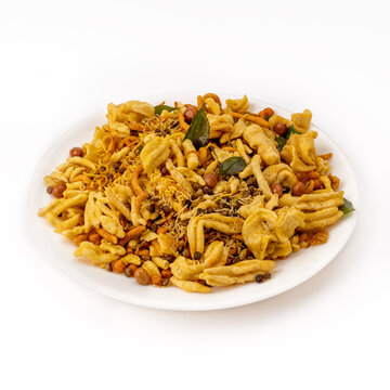 mix farsan or farsaan in a white bowl or plate 