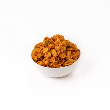 maka or cornflakes chivada or chiwada in white bowl on white background 
