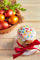 Easter cake with sweet icing on a wooden background.