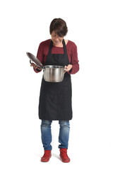 front view of housewife looking at a pot with food on white background