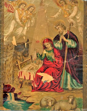 an old printed picture representing the birth of Jesus 