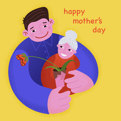 an adult son embraces an elderly mother. she is holding a flower in her hands. concept postcard