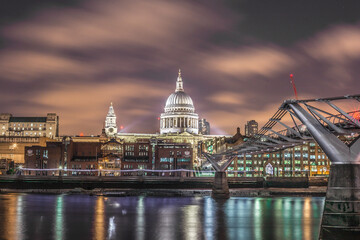 A mesmerizing shot of St. Paul's Cathedral and Millenium Bridge in London