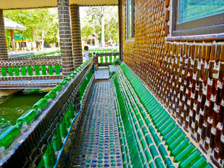 Obraz premium This is an amazing million bottles temple. The part of the building made with bottles, bottles in the temple about 1,500,000 bottles. it's the best way to reuse the bottles again.