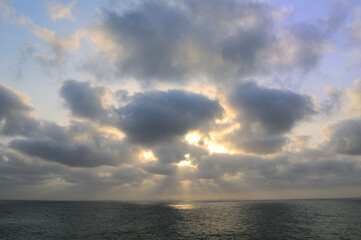 Fototapeta premium clouds over the sea with sun Arabian sea, Gwadar pakistan