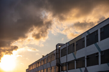 Wall of a factory in the sunshine