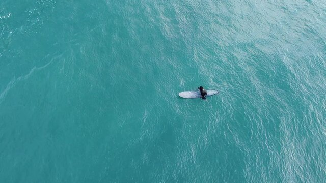Beautiful blue beach surfing shot in 4k. Volcanic island
