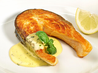Grilled Salmon Chop - Fish Fillet with Sauce Hollandaise, isolated on white Background.