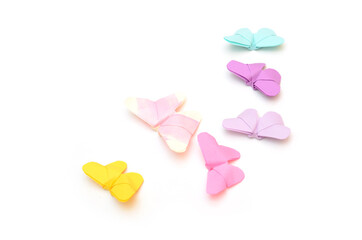 Leading origami butterflies isolated white
