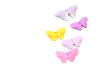 Paper origami butterflies on white