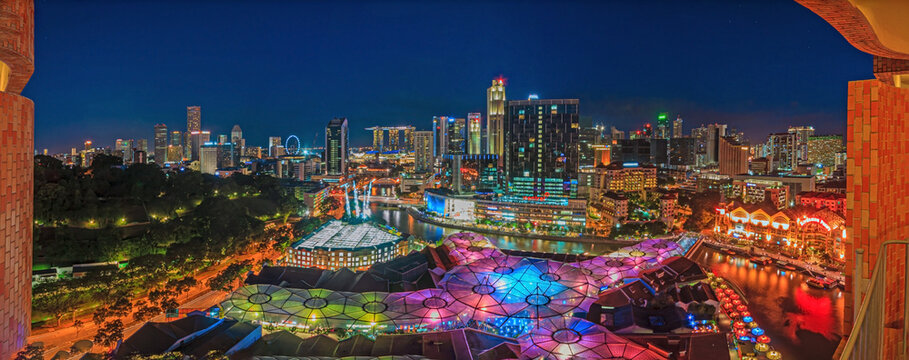 Bird's eye panoramic view of Singapore skyline and Clarke Quay entertainment district