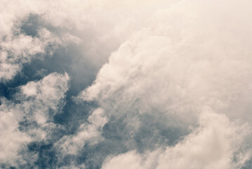 Formation of stormy cloud in fluctuation summer blue sky atmosphere. Dramatic sky painted by color and light on twilight clouds for aesthetic background.