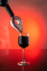 Naklejka na ściany i meble pour wine through the aerator to oxygenate the wine, stream the wine with bubbles