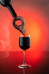 Obraz na płótnie Canvas pour wine through the aerator to oxygenate the wine, stream the wine with bubbles