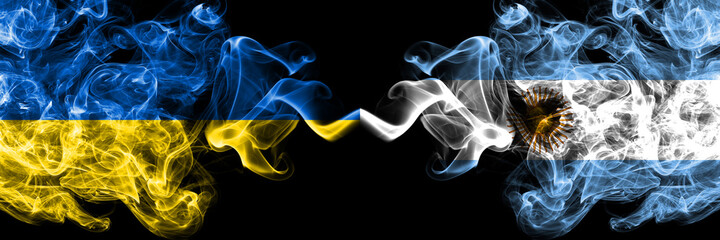 Ukraine, Ukrainian vs Argentina, Argentinian, Argentine smoky mystic flags placed side by side. Thick colored silky abstract smokes flags.