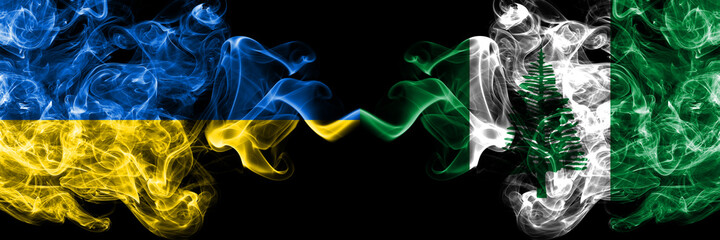Ukraine, Ukrainian vs Australia, Australian, Norfolk Island smoky mystic flags placed side by side. Thick colored silky abstract smokes flags.