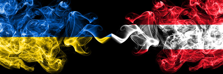 Ukraine, Ukrainian vs Austria, Austrian smoky mystic flags placed side by side. Thick colored silky abstract smokes flags.