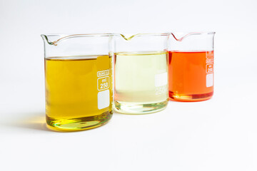 cosmetic natural oils in chemical glass jars