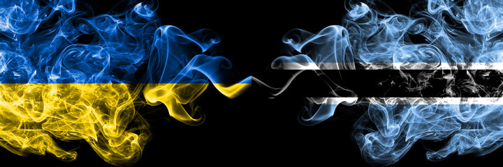 Ukraine, Ukrainian vs Botswana, Batswana smoky mystic flags placed side by side. Thick colored silky abstract smokes flags.