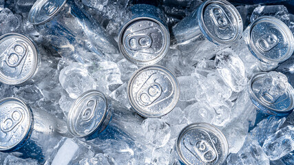cold cans inside a cooler filled with ice