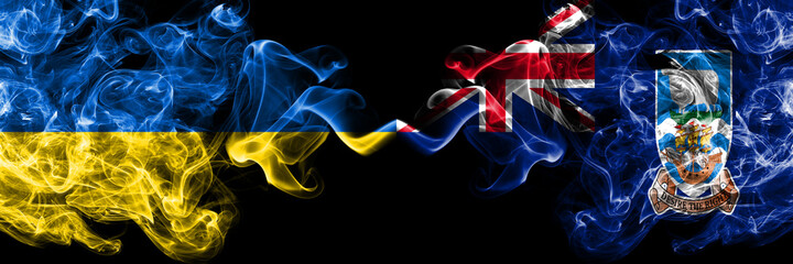 Ukraine, Ukrainian vs British, Britain, Falkland Islands smoky mystic flags placed side by side. Thick colored silky abstract smokes flags.