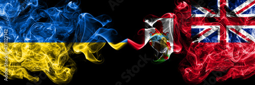 Ukraine, Ukrainian vs British, Britain, Bermuda smoky mystic flags placed side by side. Thick colored silky abstract smokes flags.