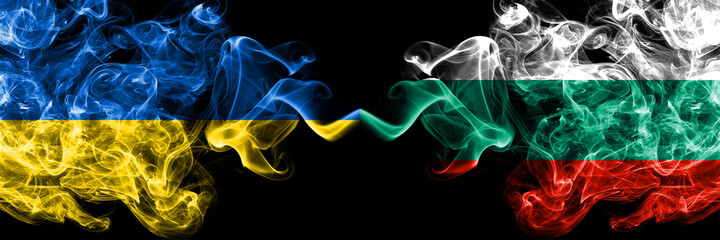 Ukraine, Ukrainian vs Bulgaria, Bulgarian smoky mystic flags placed side by side. Thick colored silky abstract smokes flags.