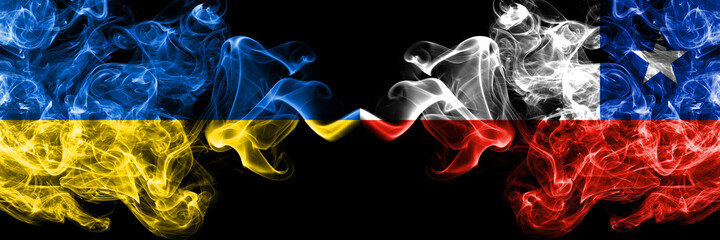 Ukraine, Ukrainian vs Chile, Chilean smoky mystic flags placed side by side. Thick colored silky abstract smokes flags.