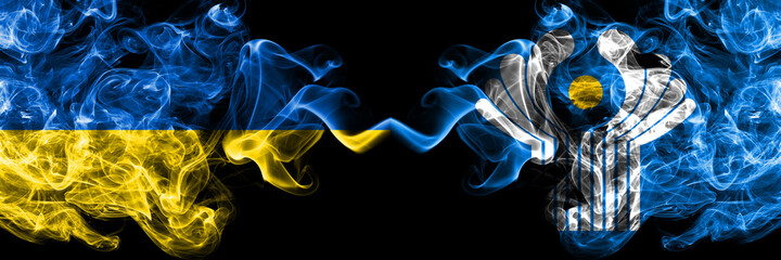 Ukraine, Ukrainian vs Commonwealth smoky mystic flags placed side by side. Thick colored silky abstract smokes flags.