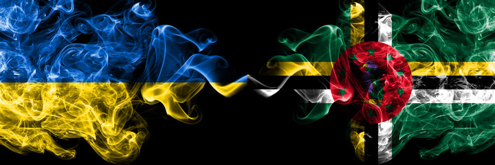 Ukraine, Ukrainian vs Dominica, Dominican smoky mystic flags placed side by side. Thick colored silky abstract smokes flags.