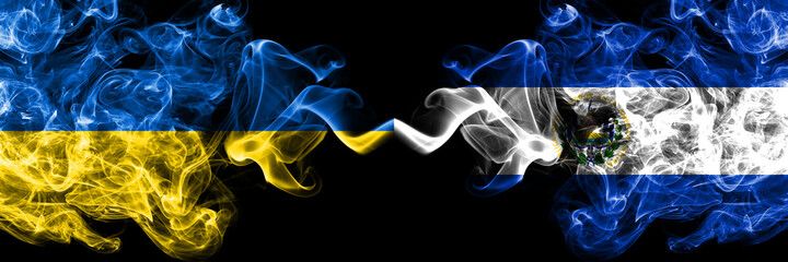 Ukraine, Ukrainian vs El Salvador, Salvadorian smoky mystic flags placed side by side. Thick colored silky abstract smokes flags.