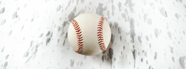 baseball ball on white background with wet water splatter marks, rain out game concept as banner