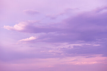 Epic dramatic sunrise, sunset purple pink violet blue sky with clouds abstract background texture