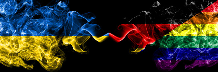 Ukraine, Ukrainian vs Germany, German, Gay, Pride smoky mystic flags placed side by side. Thick colored silky abstract smokes flags.