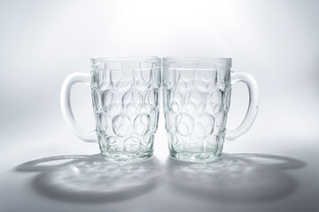 Glass mug for beer on white background