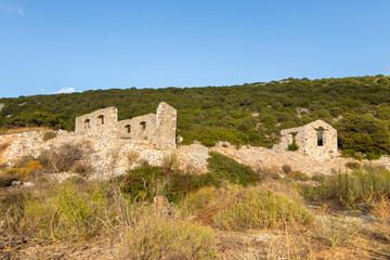 Fototapeta na wymiar Ruins of house at the ancient Paros marble quarries, Greece.