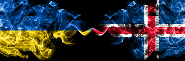 Ukraine, Ukrainian vs Iceland, Icelandic smoky mystic flags placed side by side. Thick colored silky abstract smokes flags.