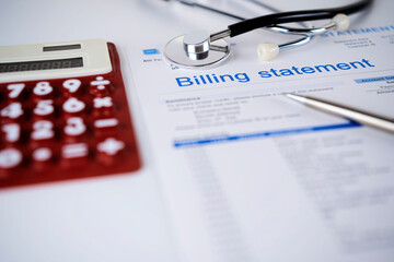 Health care billing statement with stethoscope, bottle of medicine for doctor's