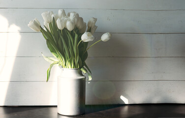 bouquet of tulips on wooden background 