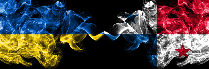 Ukraine, Ukrainian vs Panama, Panamanian smoky mystic flags placed side by side. Thick colored silky abstract smokes flags.